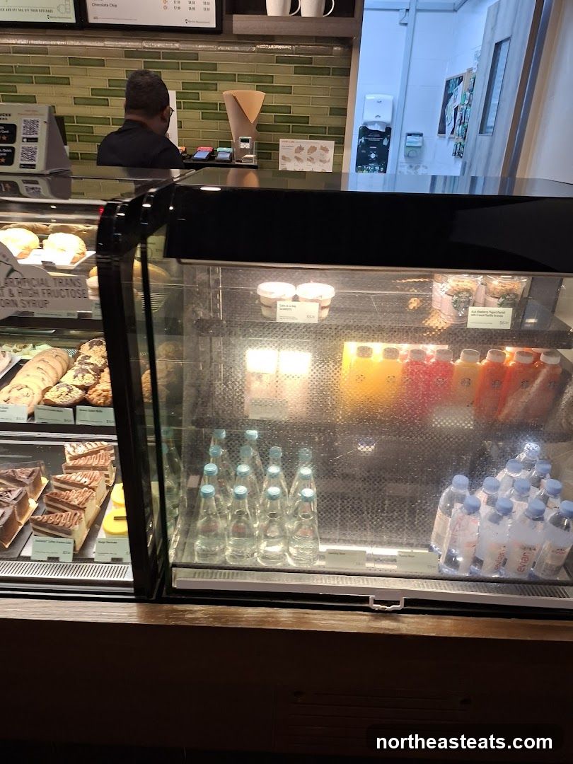 Refrigerated Display Case with Drinks and Desserts