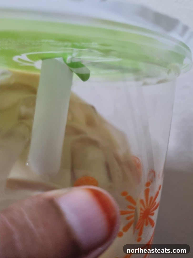 Close-up of a beverage in a plastic cup