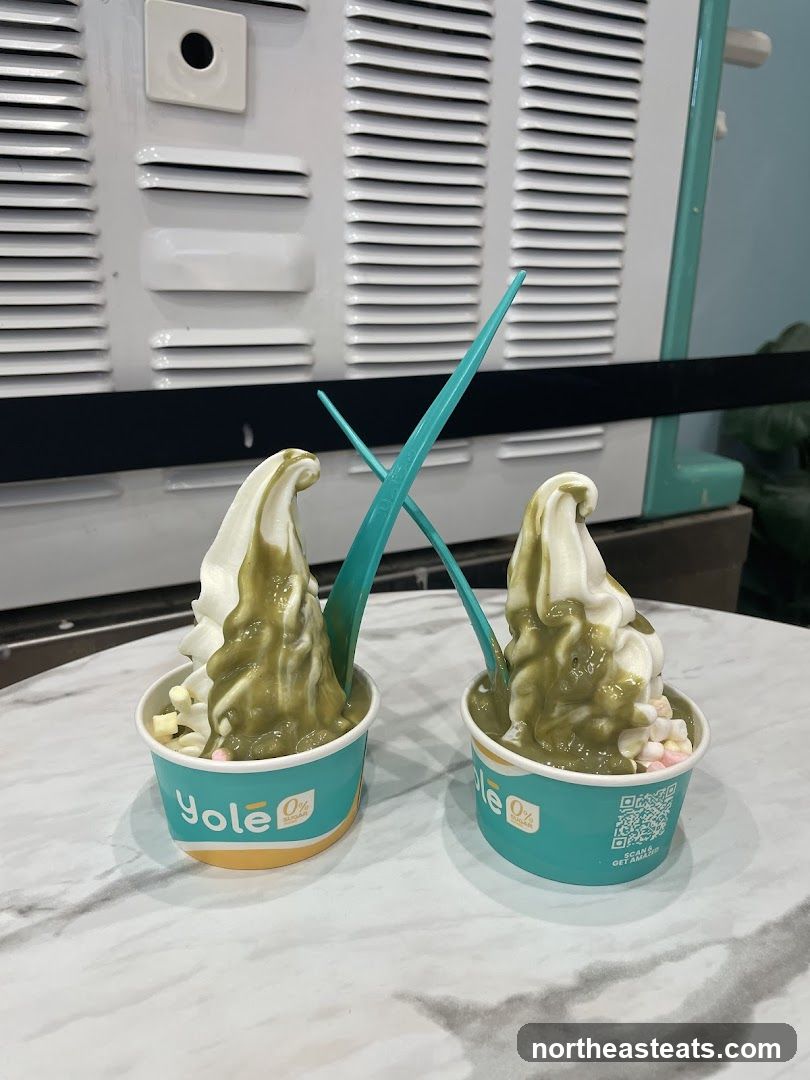 Two cups of soft serve ice cream