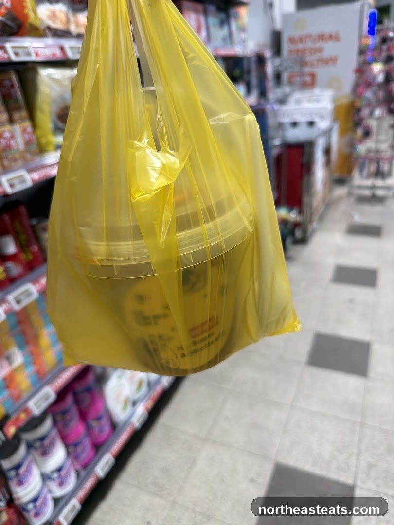 Yellow plastic bag with food containers