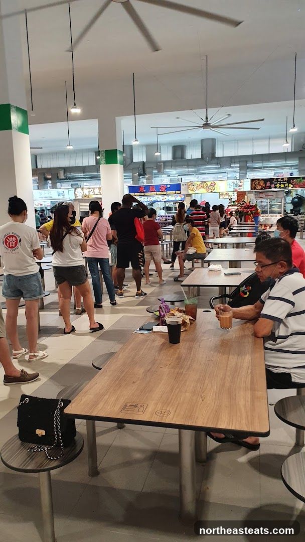 Food court with people queuing