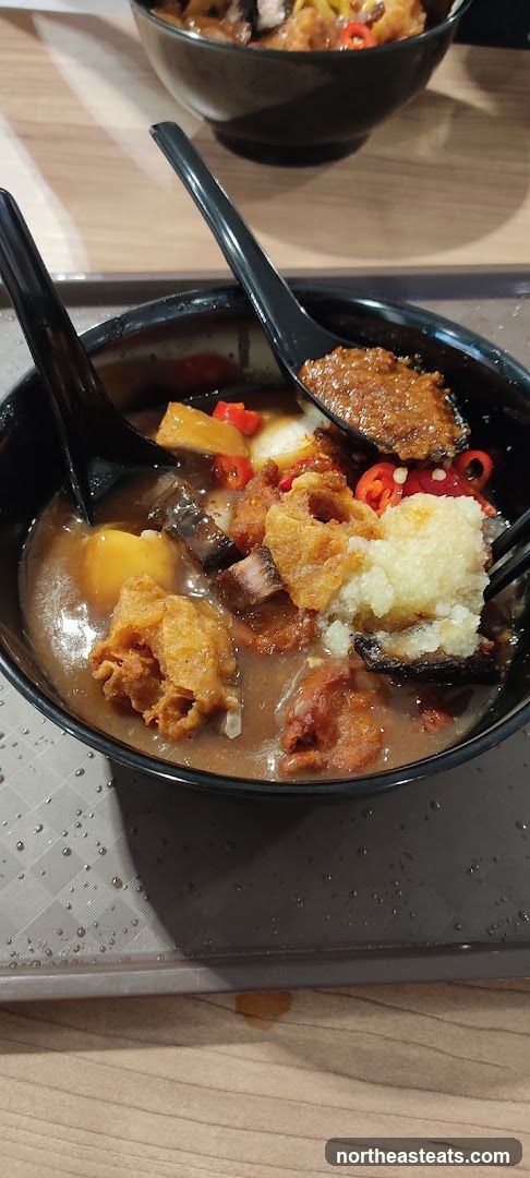 Bowl of Food with Spoons