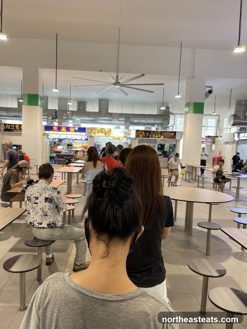 People queuing at a food court