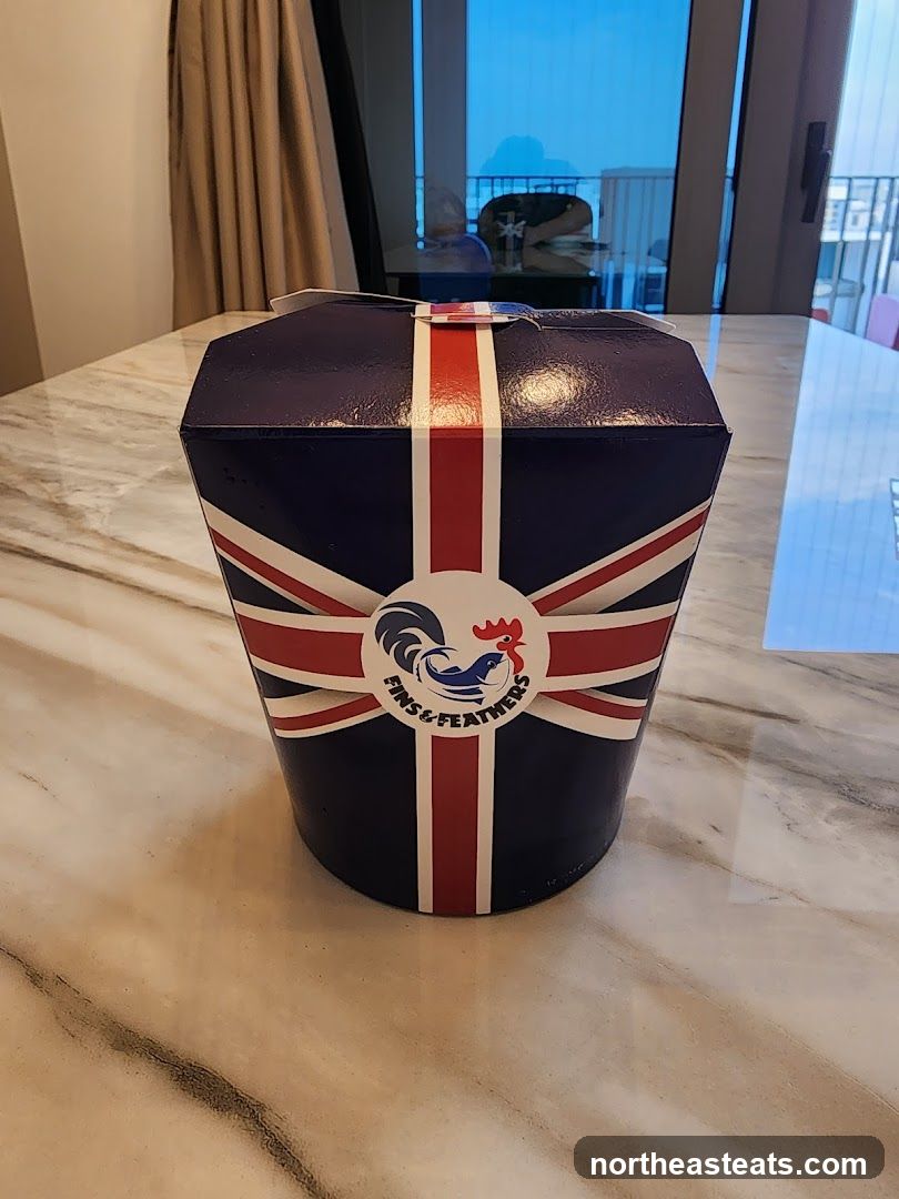 Fins & Feathers Takeout Box
