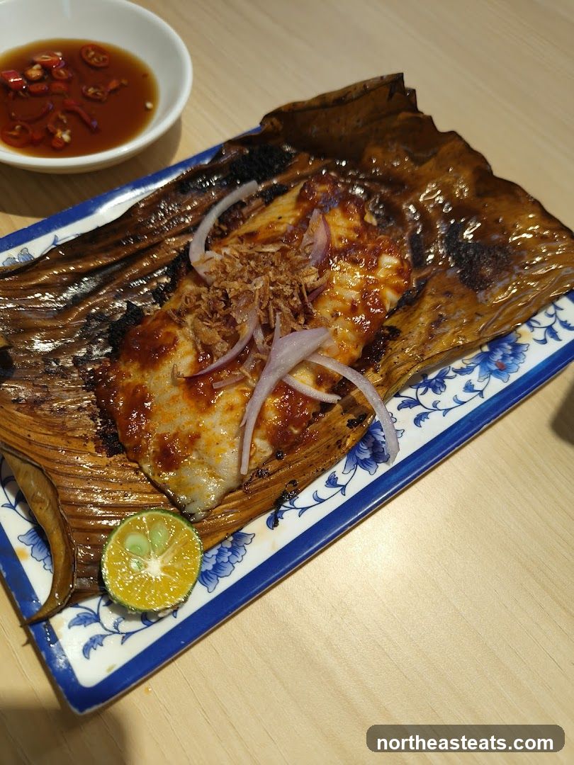 Fish dish with sauce and lime