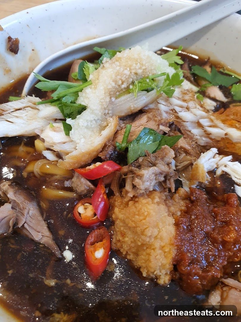 Noodle Soup with Shredded Meat and Chili
