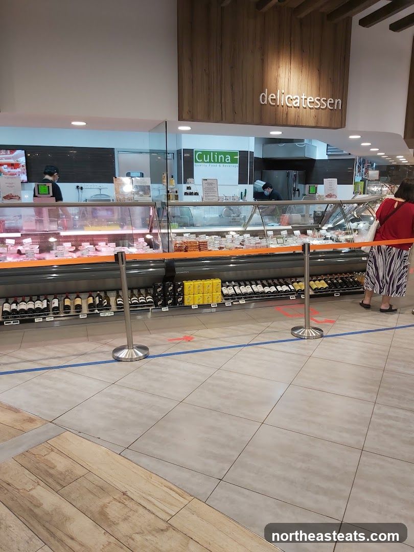 Delicatessen counter with food displays