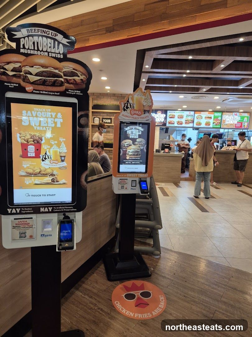 Fast Food Restaurant Interior with Self-Order Kiosks