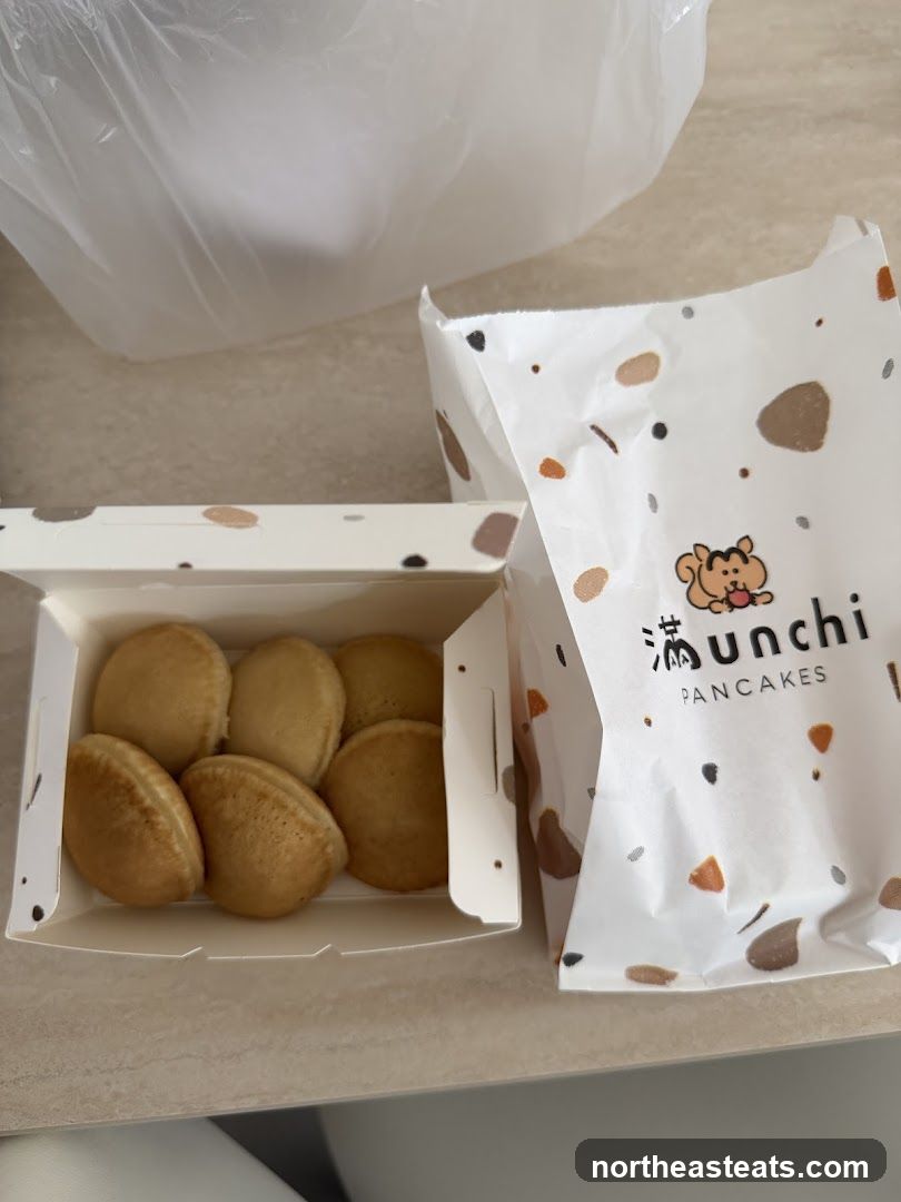 Pancakes in a box with a branded bag