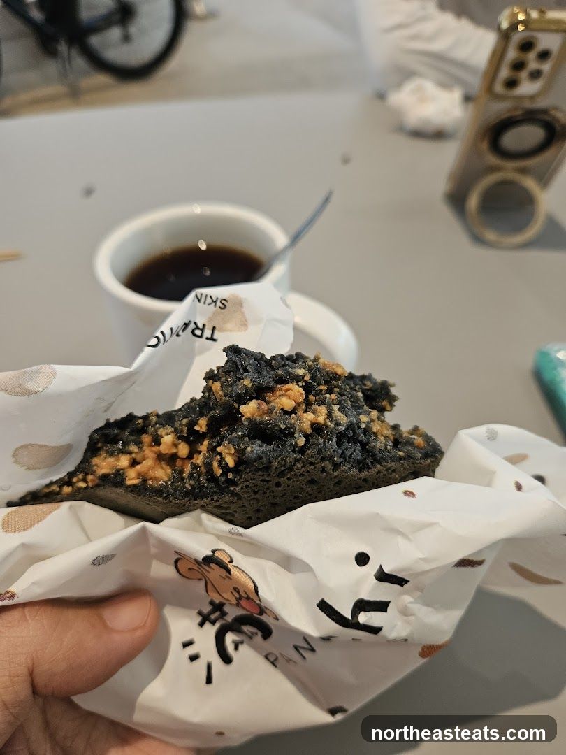 Black bread with topping and coffee