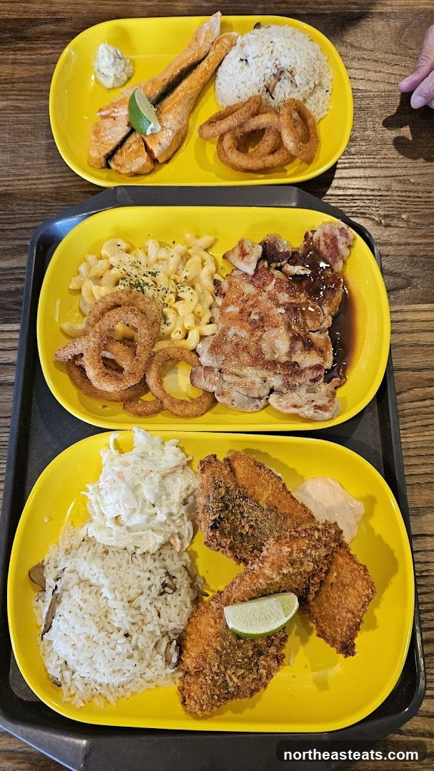 Three Yellow Plates of Food