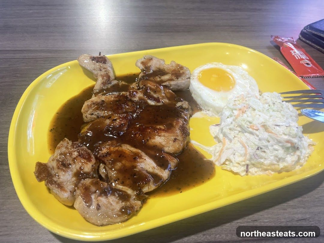 Chicken Steak with Fried Egg and Coleslaw