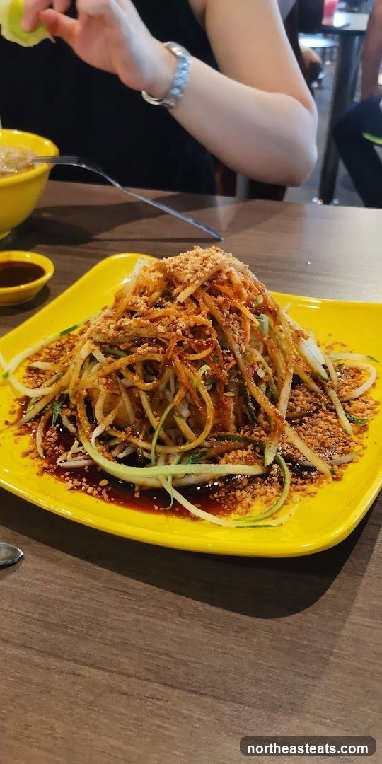Salad with peanuts and sauce