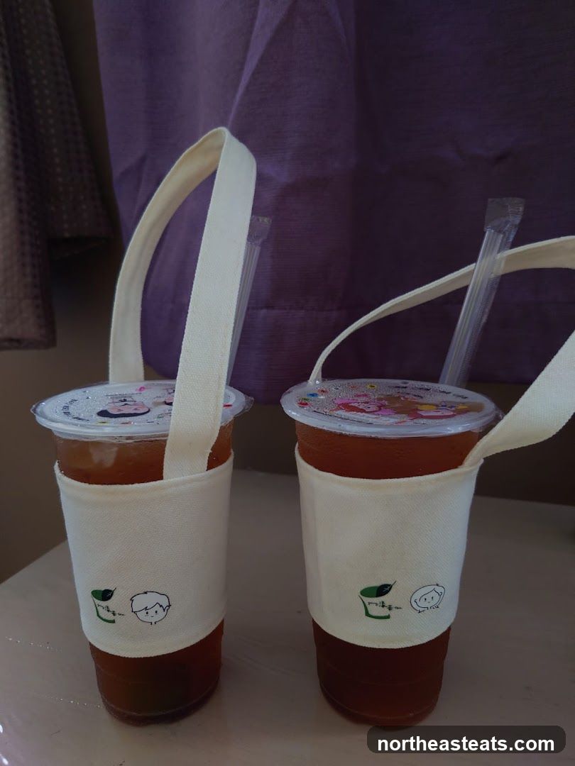 Two Iced Teas in Reusable Sleeves