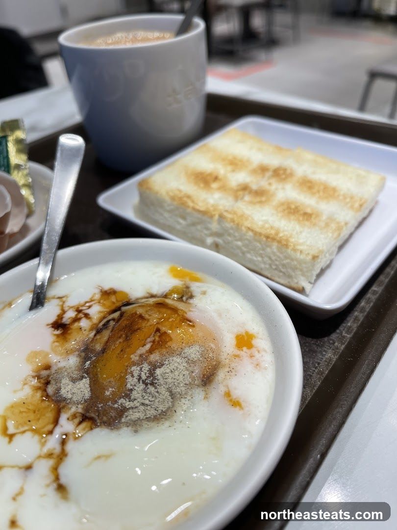 Soft-boiled eggs with toast and coffee