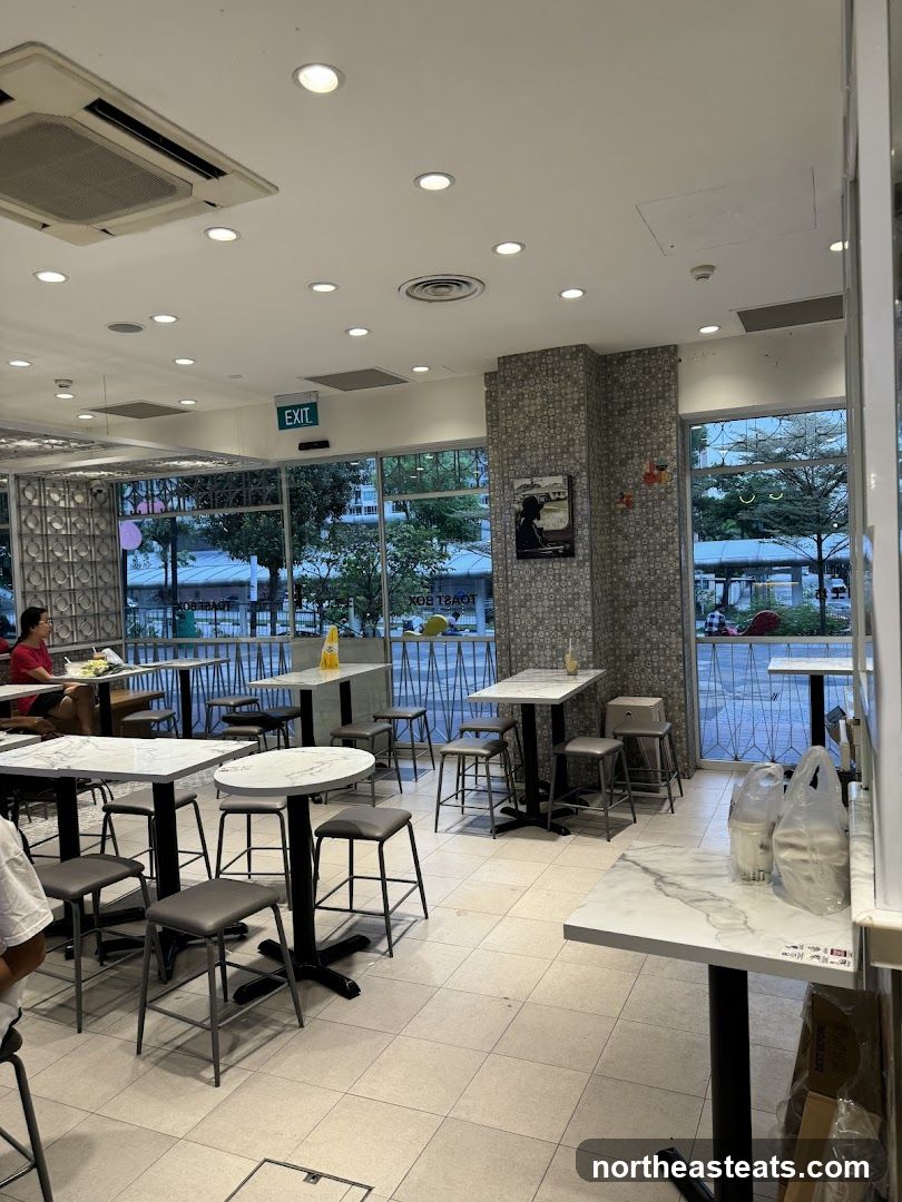 Interior of a cafe with tables and chairs