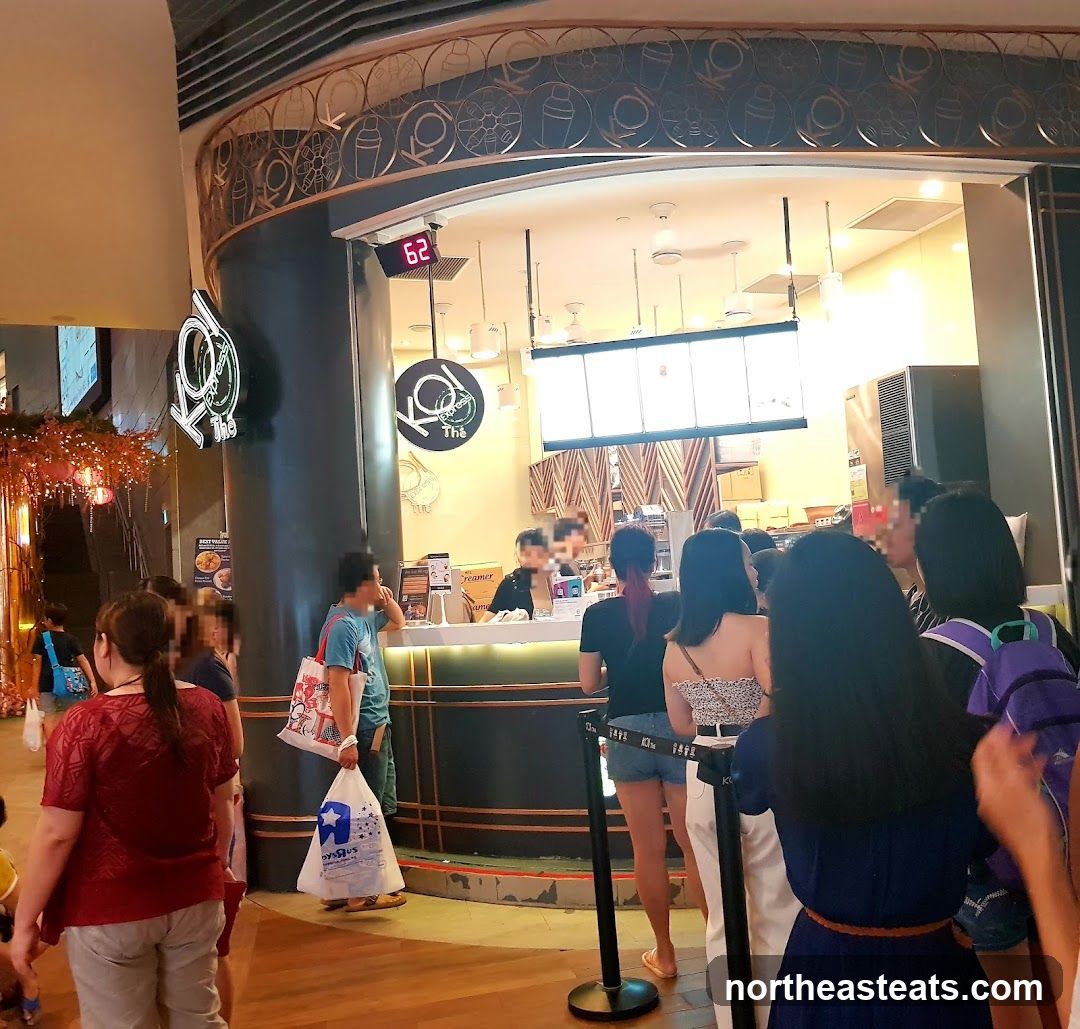 People queuing at a bubble tea shop