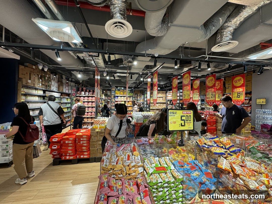 Supermarket aisle with snacks and promotions