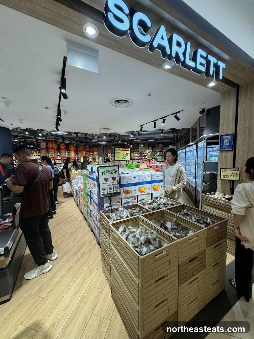 Supermarket aisle with products and shoppers