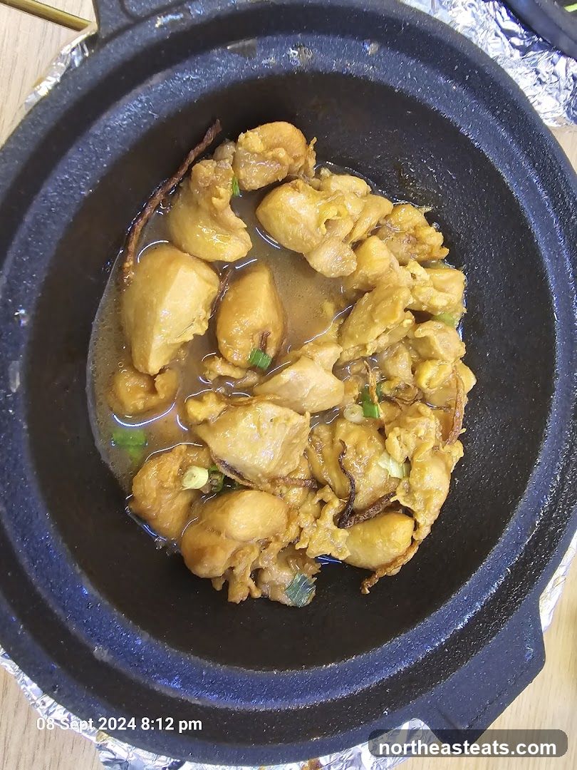 Chicken dish in a black pot