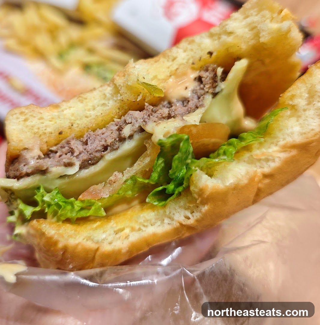 Close-up of a half-eaten burger
