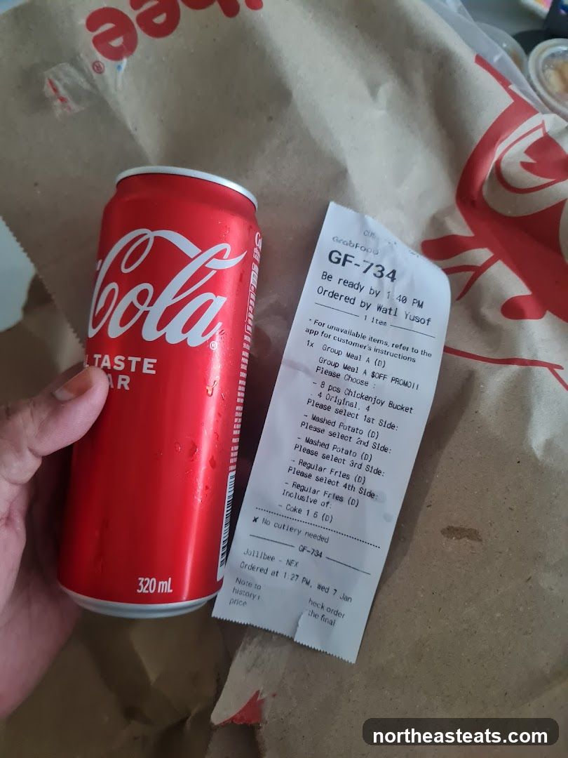Jollibee Order Receipt and Coca-Cola Can