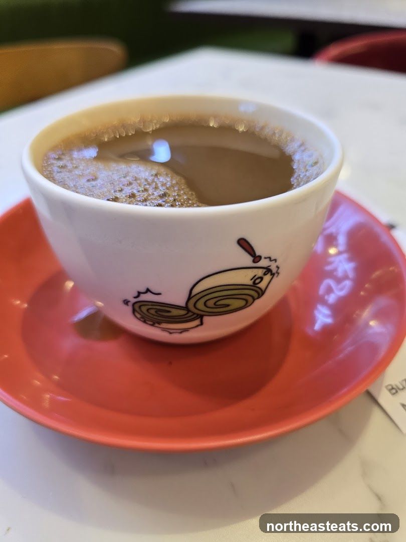 Coffee Cup with Cartoon Design