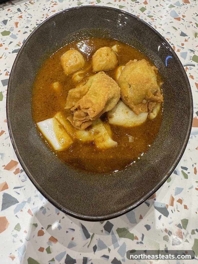 Curry Noodles with Fried Wontons and Fish Balls