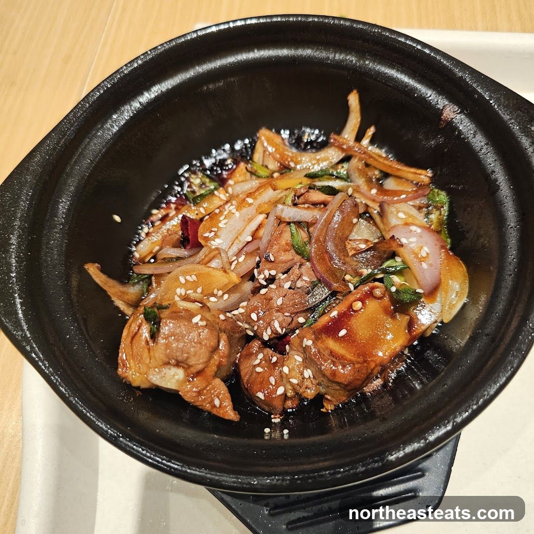 Stir-fried dish with meat and onions