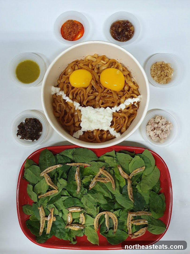 Noodles arranged as a face with a mask