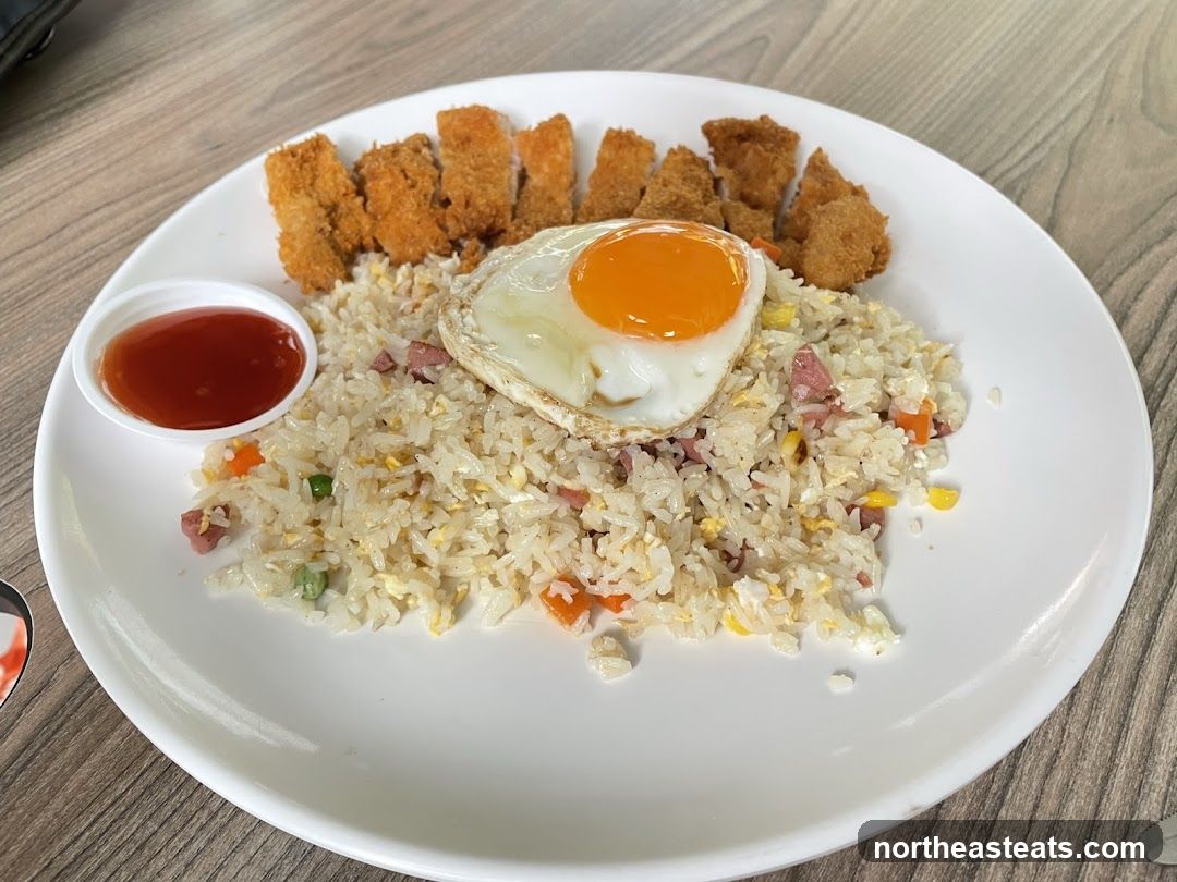 Fried Rice with Fried Egg and Chicken Nuggets