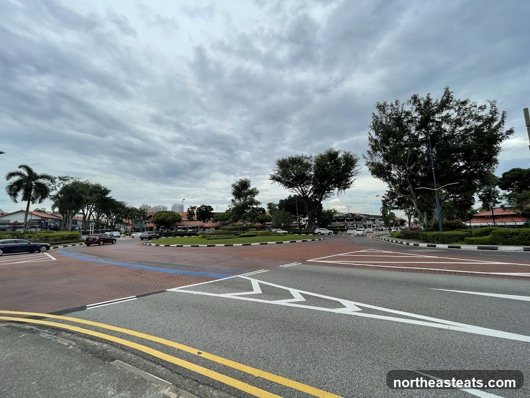 Street intersection with buildings and trees