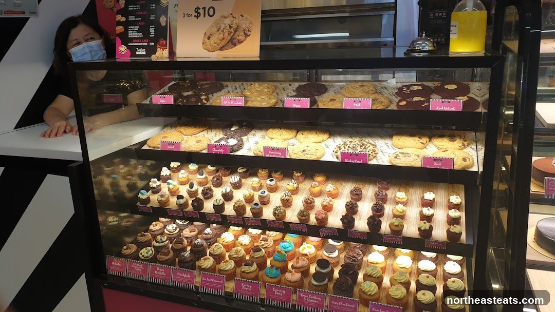 Display Case with Cookies and Cupcakes