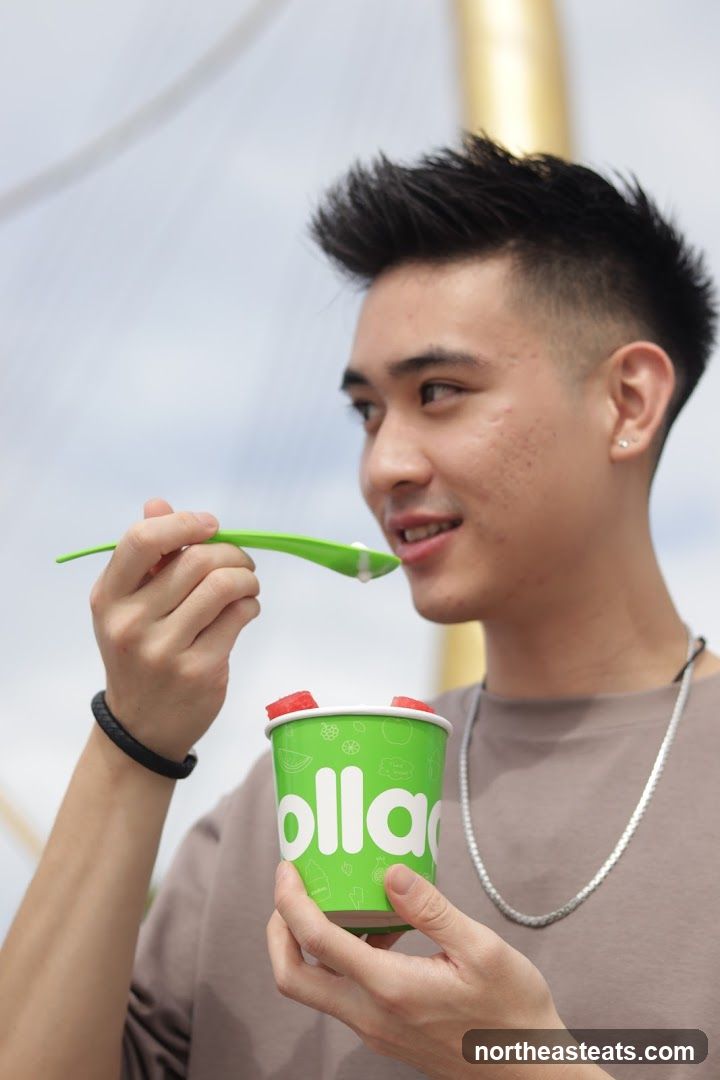 Man eating from a cup