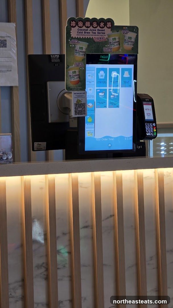 Self-service kiosk with payment terminal