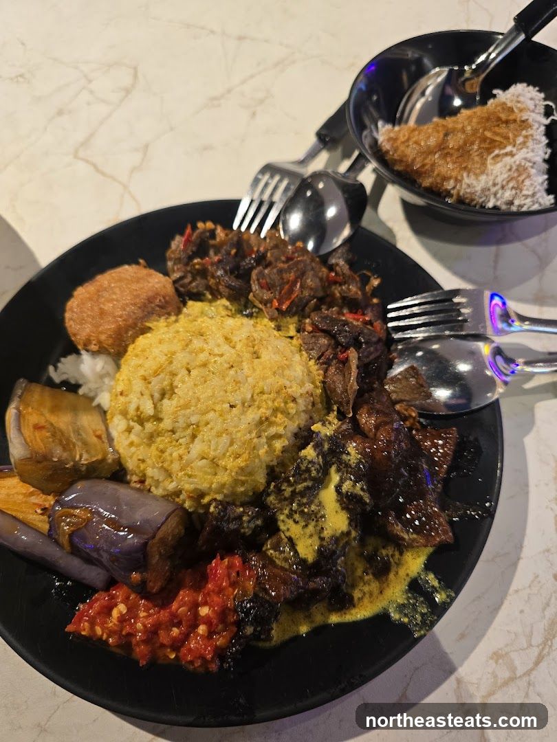 Plate of food with rice and meat