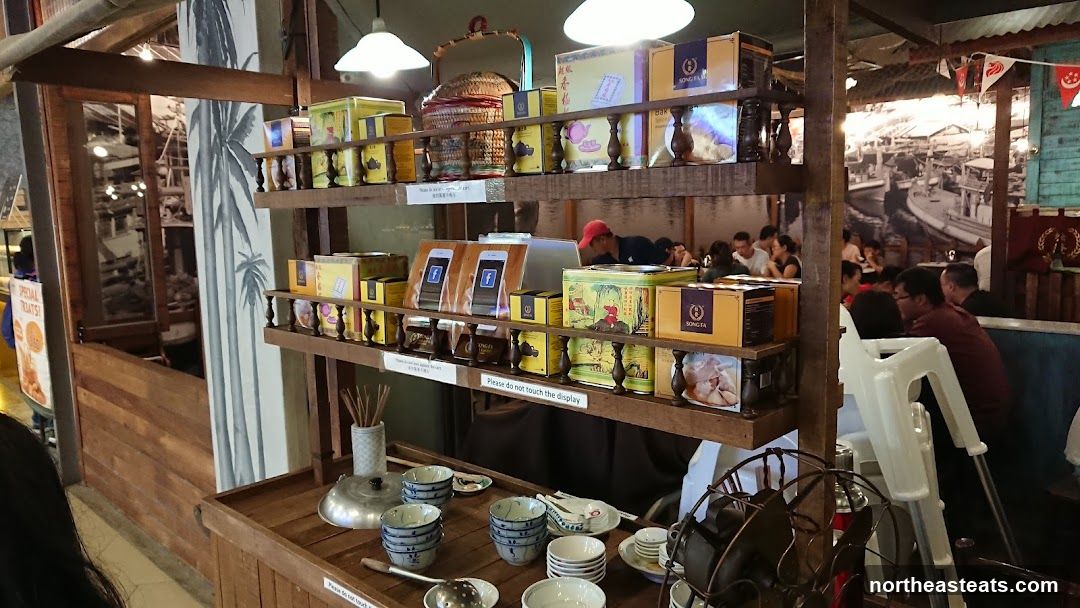 Display shelves with packaged goods and tableware