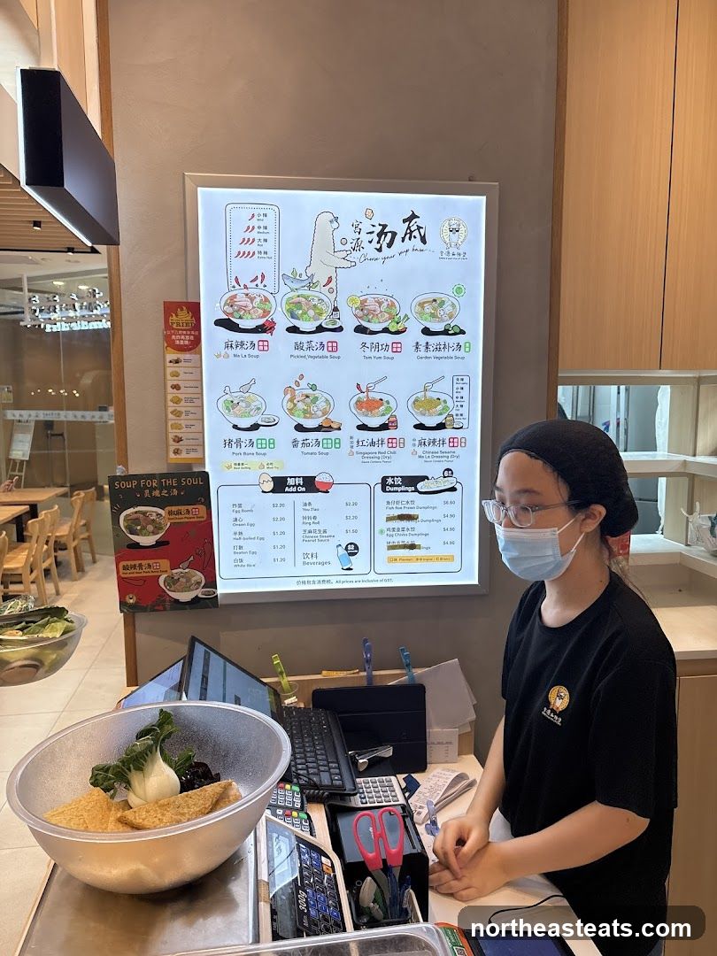 Restaurant Counter with Menu and Staff