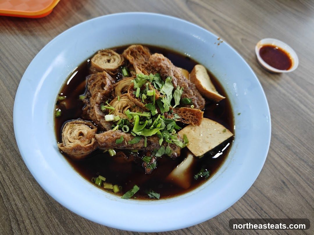 Braised Tofu and Egg Rolls in Broth
