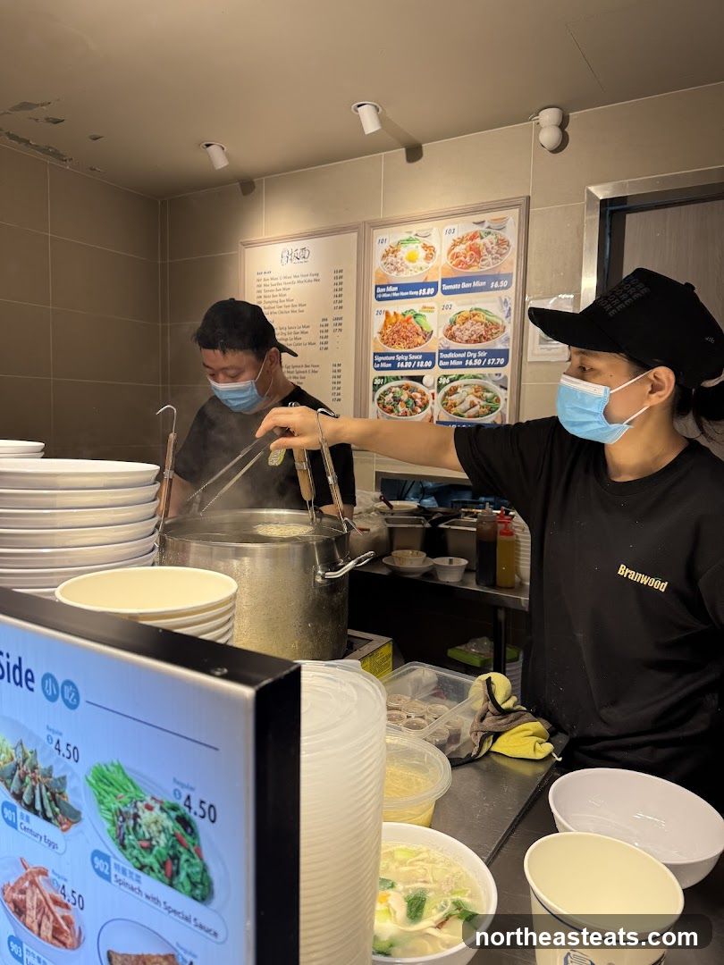 Kitchen Staff Preparing Food