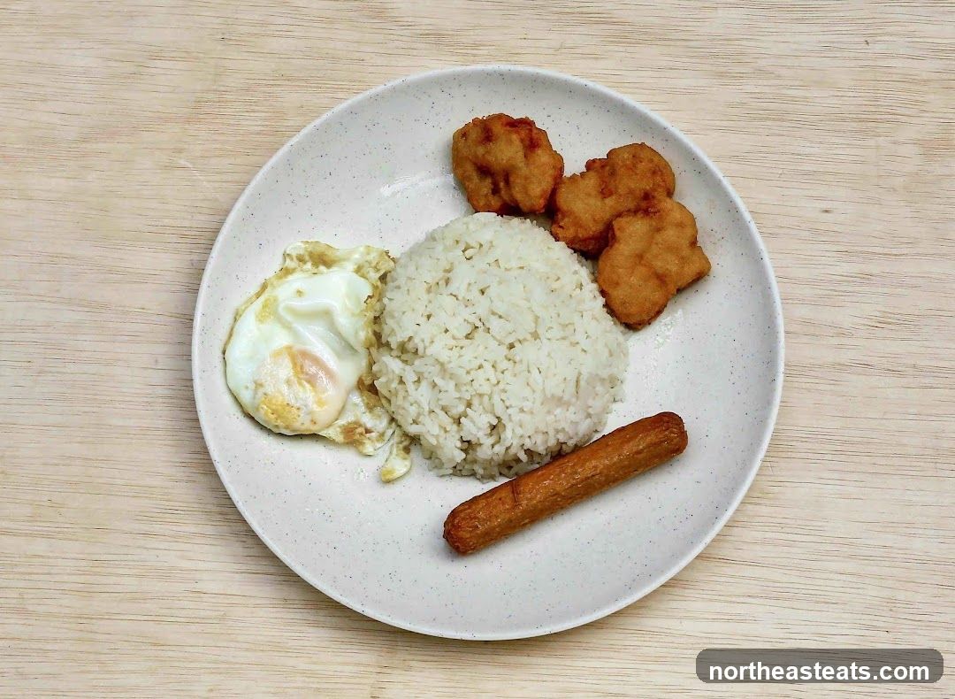 Fried Egg, Rice, and Chicken Nuggets