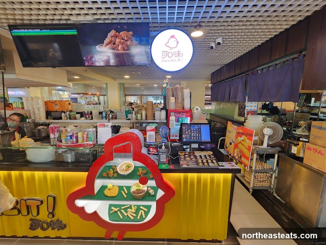 Food stall counter with menu and food displays