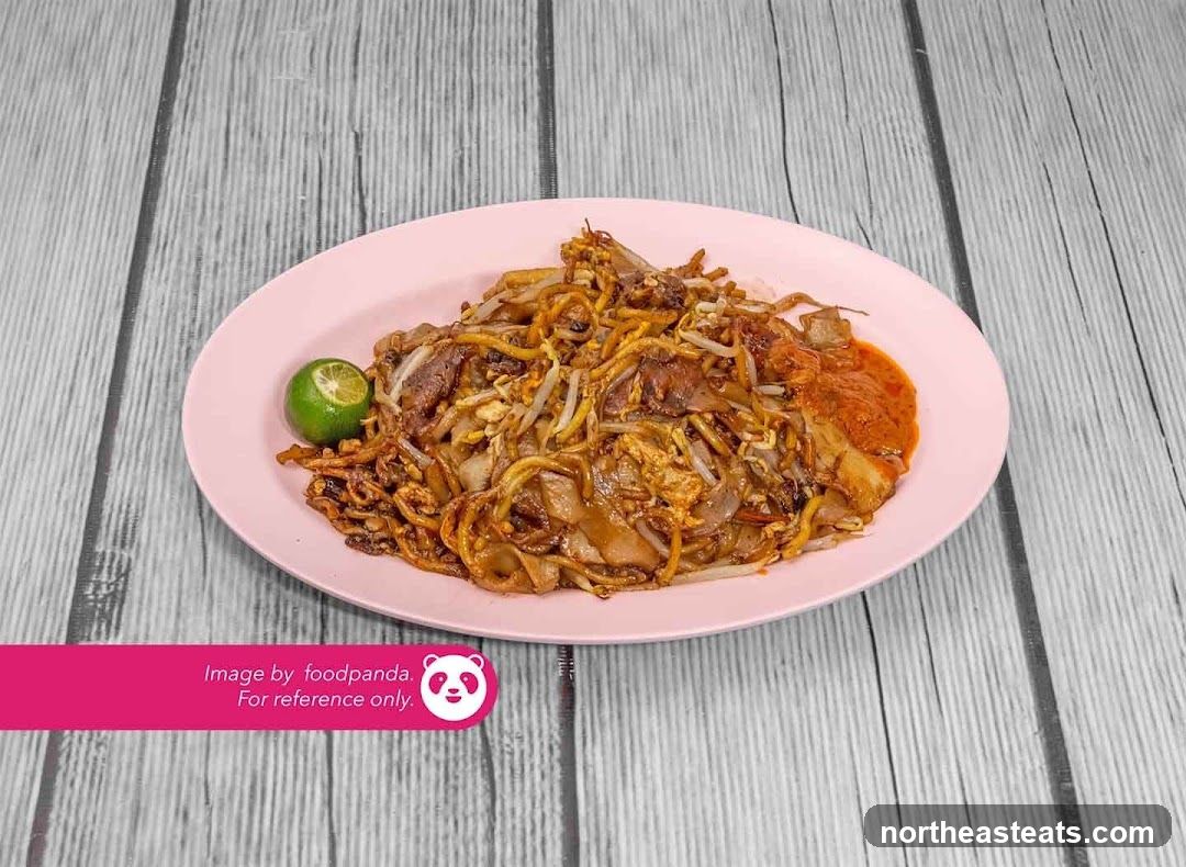Fried Noodles with Chili Sauce and Lime