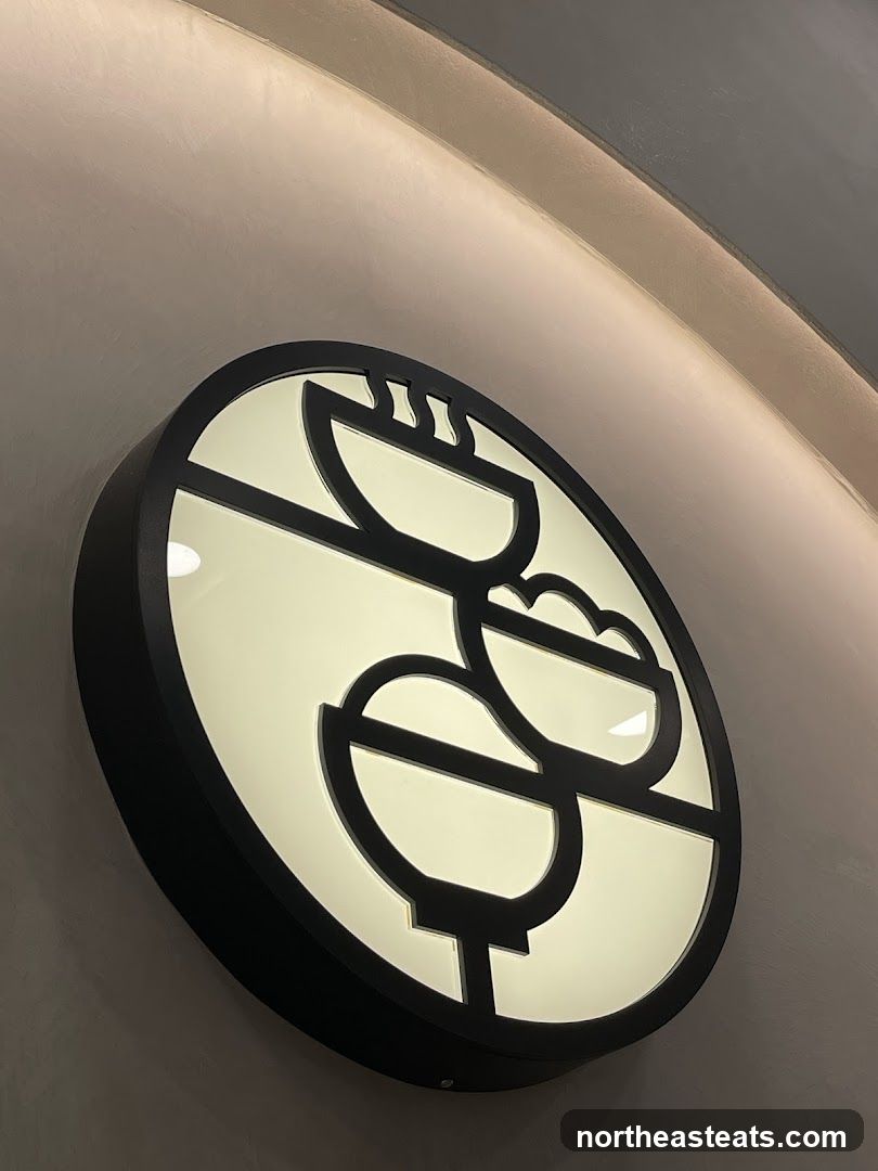 Illuminated Sign with Stylized Bowls