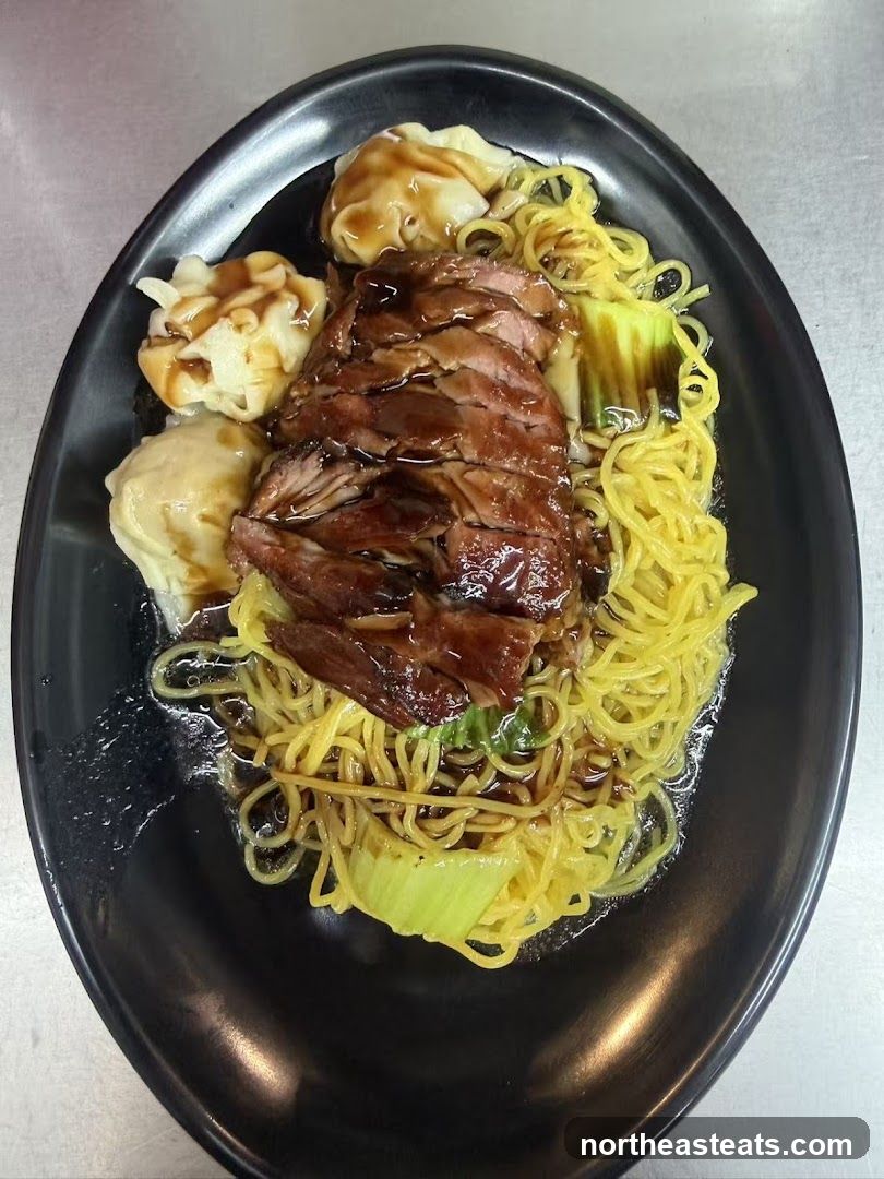 Noodle Dish with Sliced Meat and Wontons
