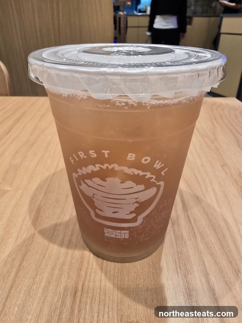 Beverage in a branded cup