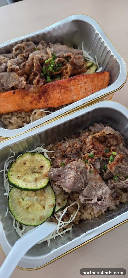 Two Takeout Containers of Food