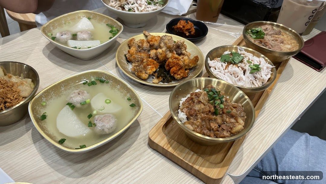 Table with various Taiwanese dishes