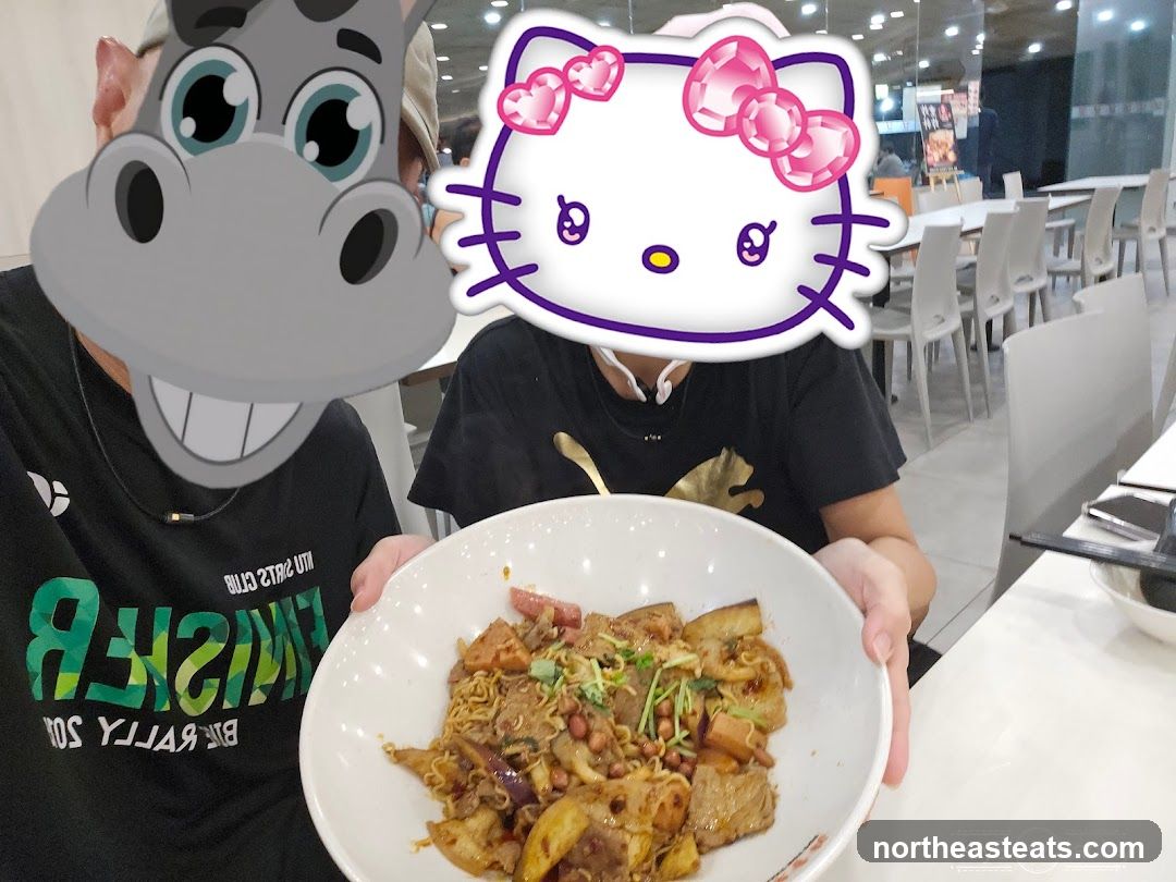 People eating at a food court