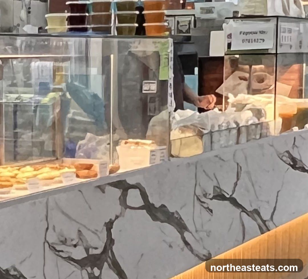 Display Case with Pastries and Drinks